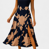María – Vestido Floral con Abertura para un Look Elegante y Femenino